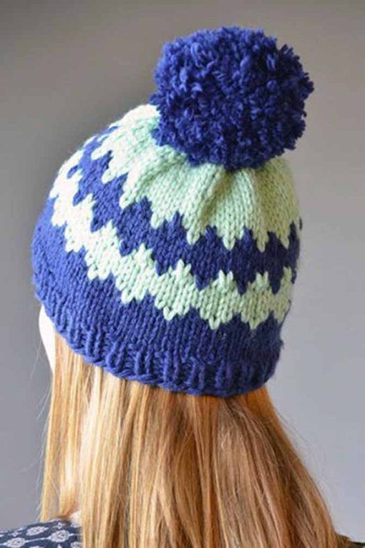 Icy winter blues in a diamond motif ring this ski hat knit in Deluxe Bulky Superwash