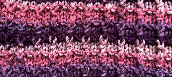 This waffle-like texture disrupts the Deluxe Stripes and creates even more depth; using Universal Yarn Deluxe Stripes to knit this blanket – free pattern.