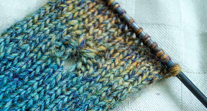 The brown and teal fibers of the Colorburst Earth and Sky colorway blend very smoothly.