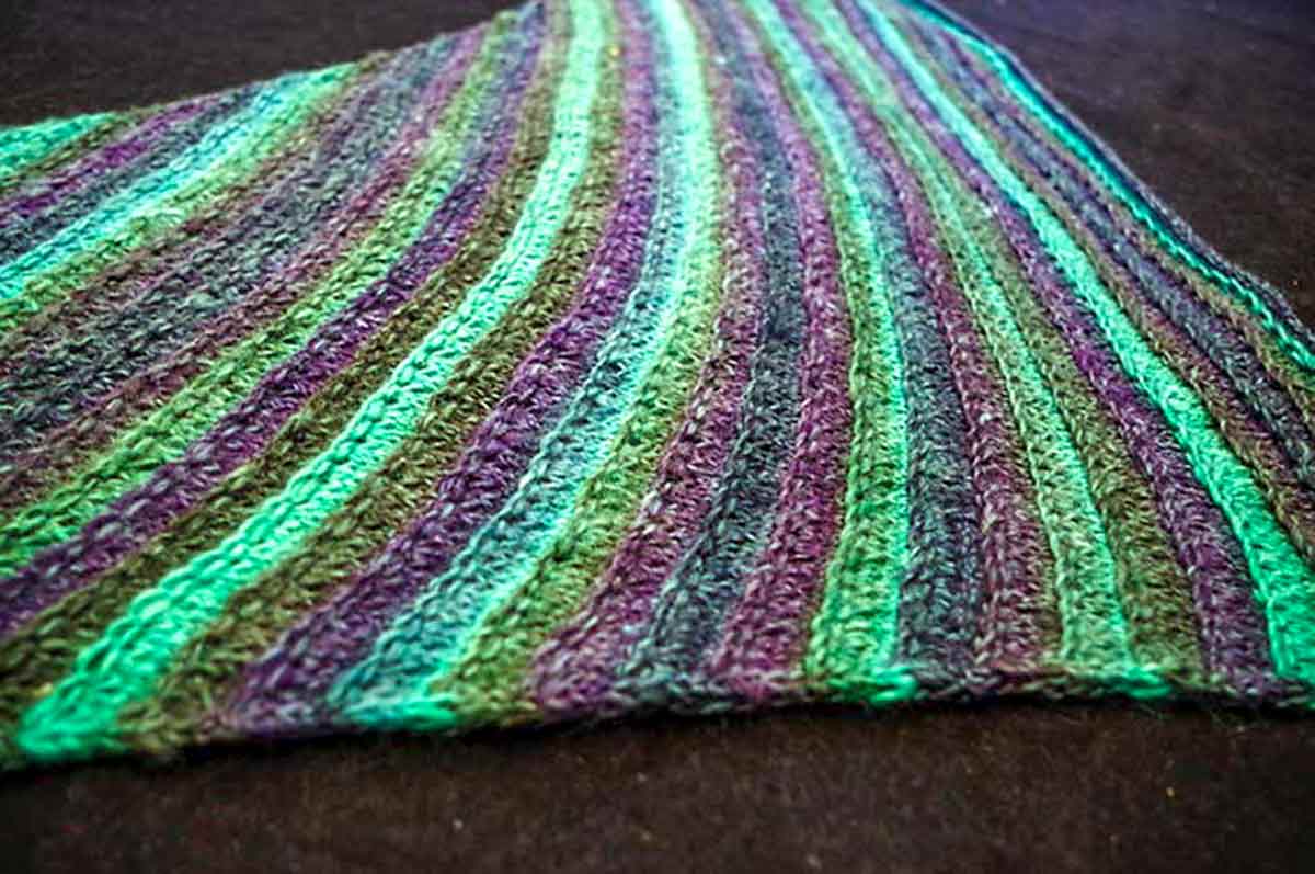 A sneak peek at tomorrow’s post: join us to learn how to knit this asymmetrical triangle in Colorburst Yarn.