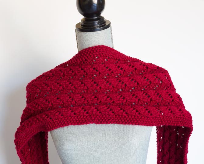 Knitting up this wrap is quick with Aran weight yarn.