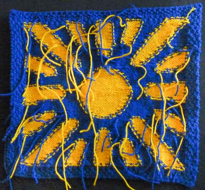About eight ends had been woven in before I remembered to take this photo of the back of the blue sample.