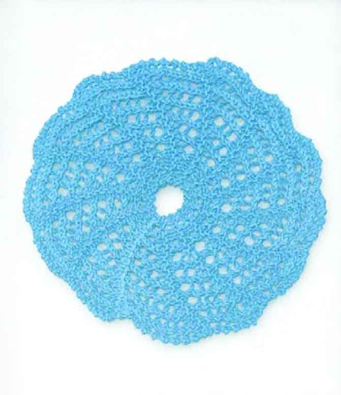 Short rows and lace make this lovely circular washcloth. Probably my first project from this book.