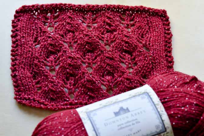 The Budding Romance Shawl uses this beautiful lace stitch. Try your hand at some lace knitting with this pattern!