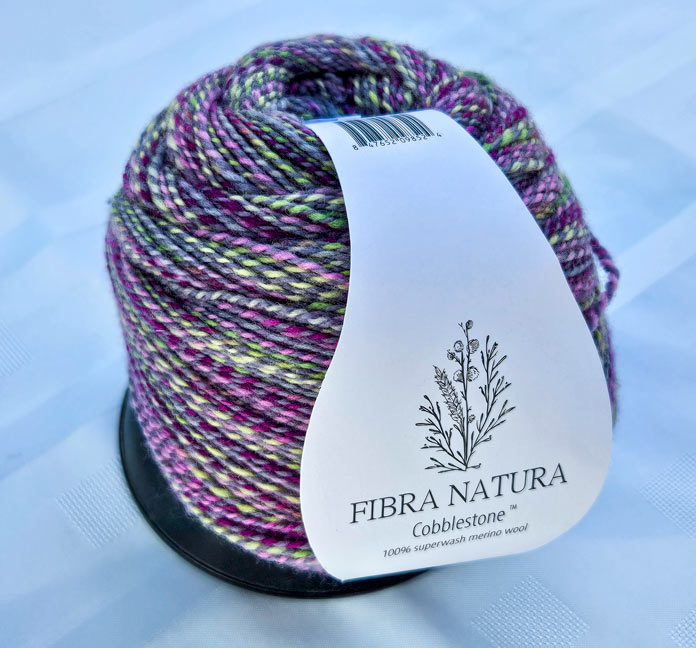 2 ply merino superwash with 1 ply solid and the other variegated; FIBRA NATURA Cobblestone which is a soft, 2-ply 100% merino wool yarn