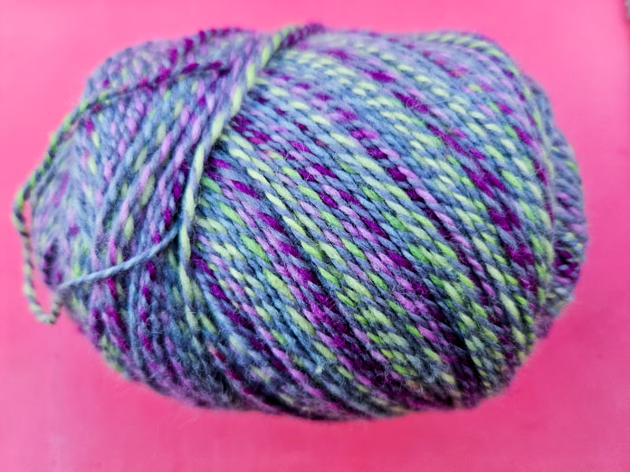 2-ply merino superwash with 1 ply solid grey and the other variegated; FIBRA NATURA Cobblestone which is a soft, 2-ply 100% merino wool yarn