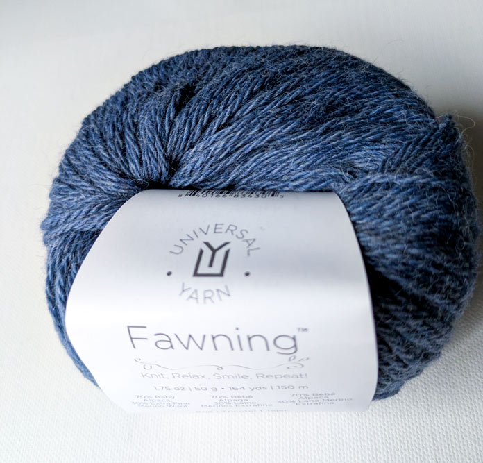 A ball of blue-gray yarn with a label; Yarn Reviews, UNIVERSAL YARN, Fawning, KNITTER’S PRIDE LANTERN MOON, LANTERN MOON fixed circular needle, free knitting patterns, double stitch short rows, notions, knitting needles, knitted pullovers