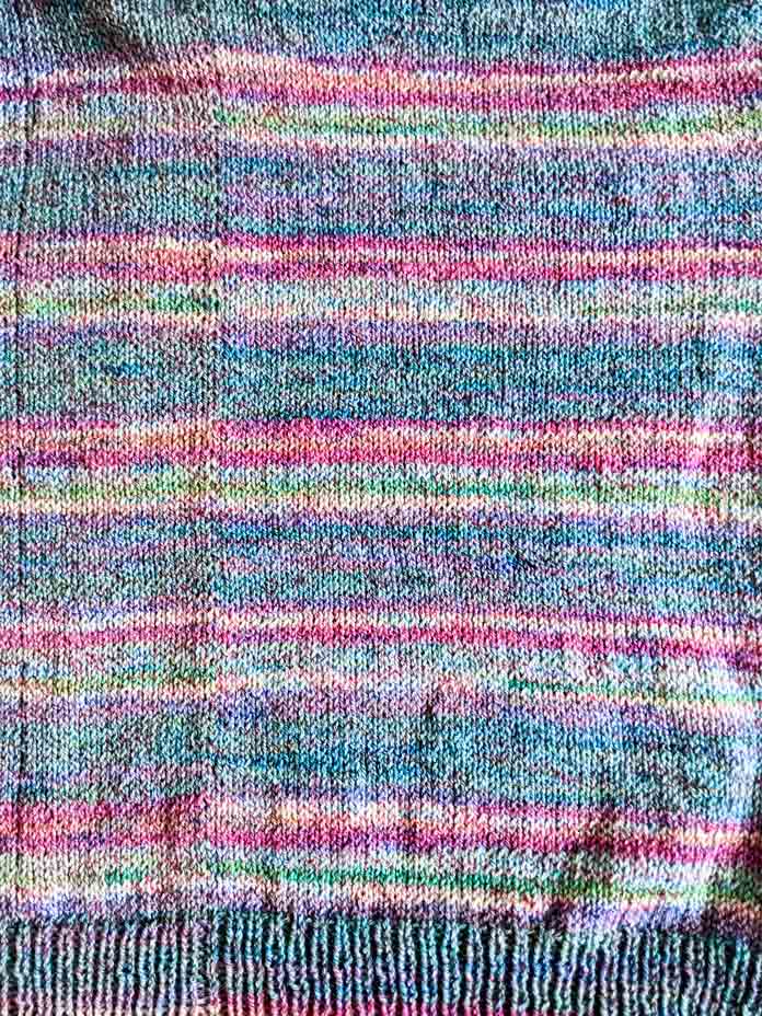 Close-up of the side seam for the Blissful Tee; Universal Yarn Filly