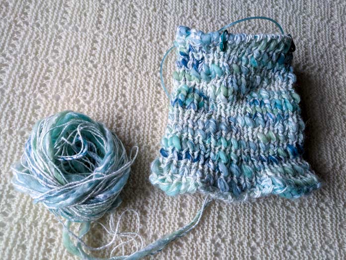 The body of a chunky hat on circular needles.