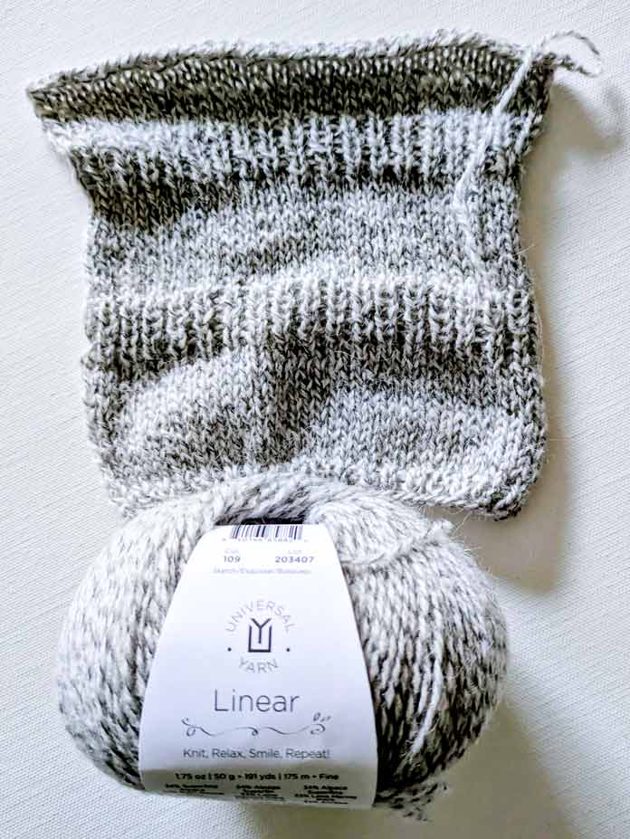 A small swatch knitted with marled yarn, Linear.