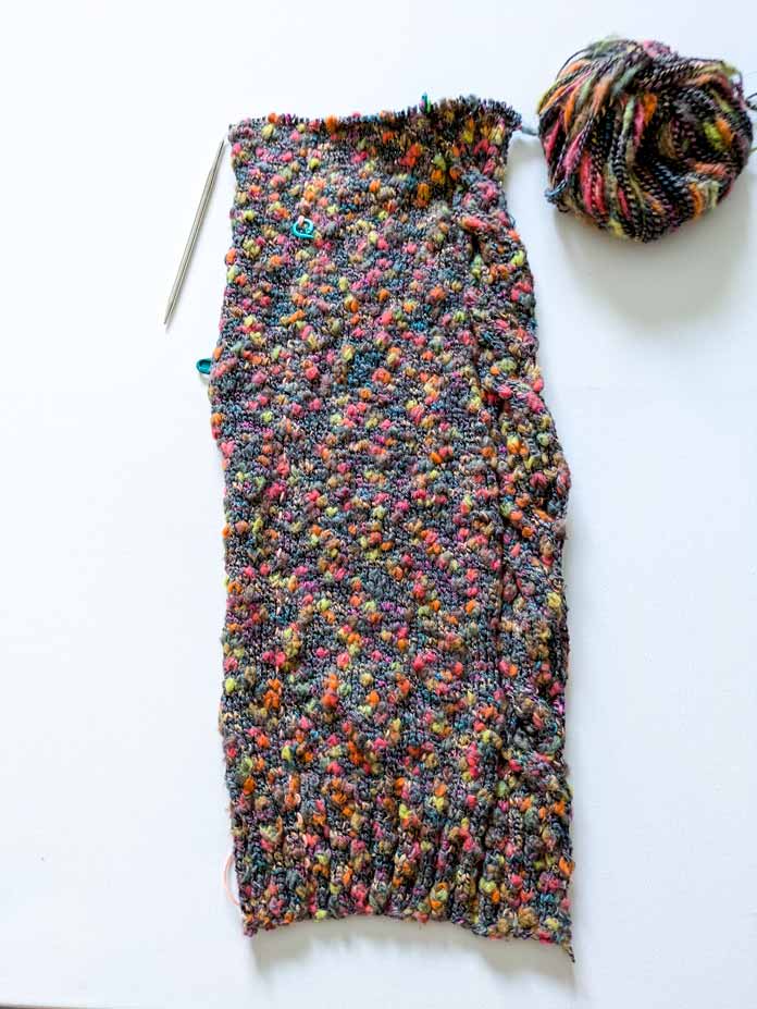The right front of the Lawson Cardigan is worked in multicolor thick and thin cotton blend yarn.