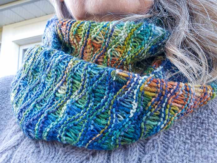 Cowl knit with Read to Dye Collection fingering weight yarn double wrapped; FIBRA NATURA Cobblestone which is a soft, 2-ply 100% merino wool yarn