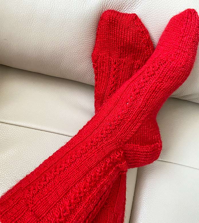 Fire engine red socks will keep my feet toasty! Red socks hand knit by Ruth I. Forbes of Crochet Designs by Nana Ruth