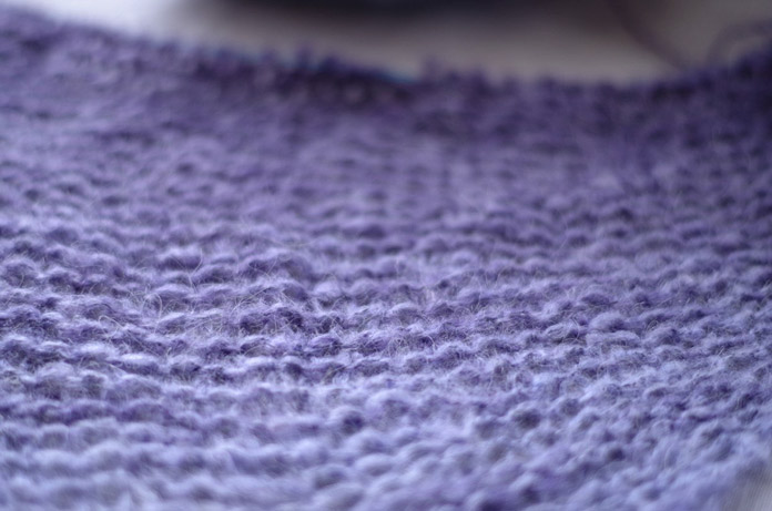 The colors transition from lavender to deep violet in this colorway of Revolutions. The free pattern for this shawl will be in tomorrow's post.