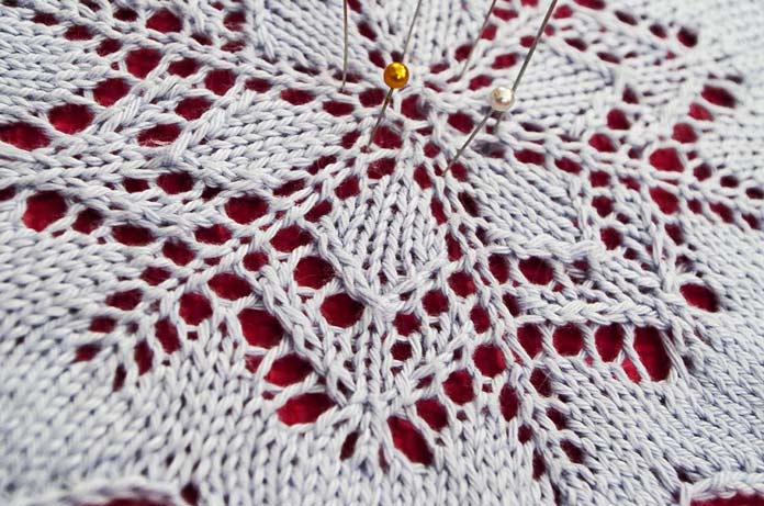 This knit doily is blocking so that it lays flat underneath some holiday goodies.