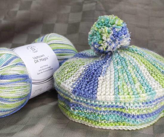Uptown DK Magix, makes a colorful, warm and soft, and fun-to-wear hat with a beret-style shape.