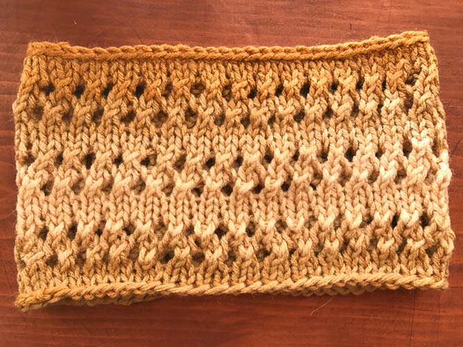 The after product of a lace knitting swatch. You'll never believe what it looked like before.