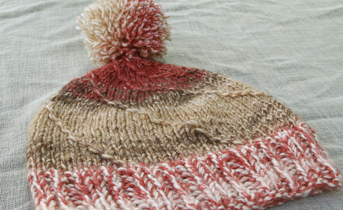 This colorway for this hat is called Russet. I really like the way these warm earth tones blend from light to dark and back again.